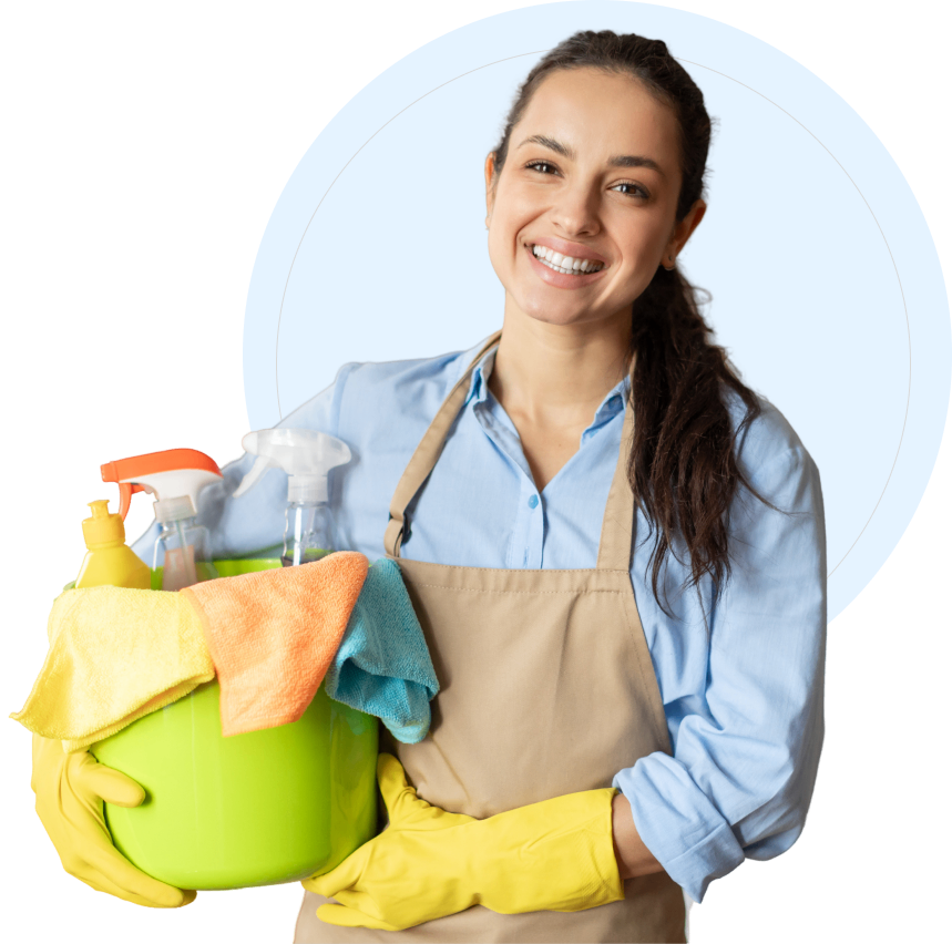 Smiling woman holding cleaning supplies bucket.